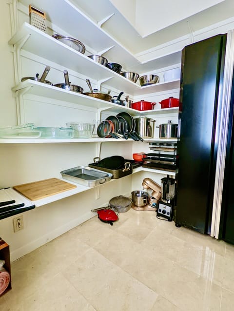 Our giant walk-in pantry features all the cooking implements you need!