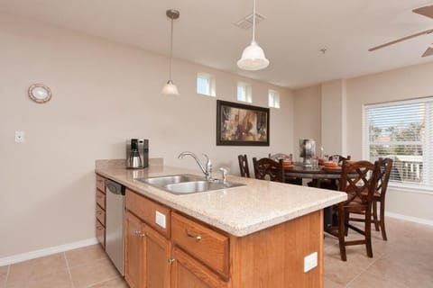 Our cozy, open floor living area includes the kitchen, dining, and living spaces.