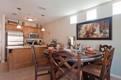 Our dining area seats 5 and is nestled behind the living area and in front of the kitchen.