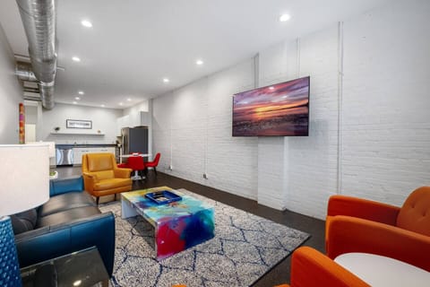 Spacious and comfy living room to hang out, have some drinks or watch TV