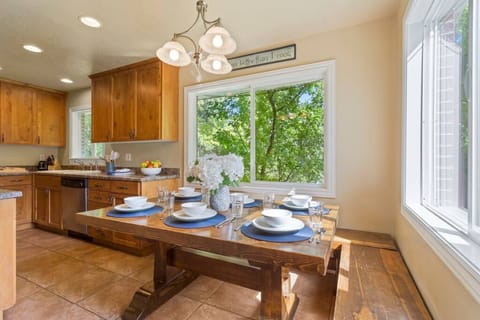 Lovely and private dining area with views of our lush backyard.