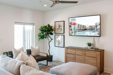 Family room with large TV and sectional