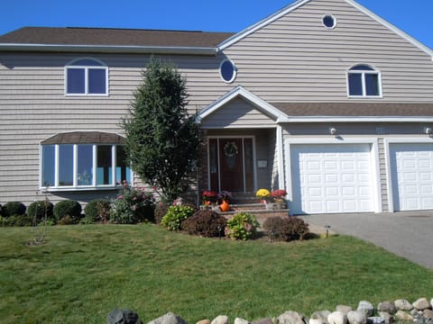 front elevation seen from the street , two car attached garage