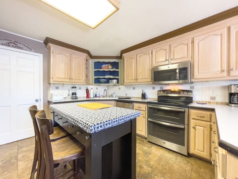 Kitchen with island on main level