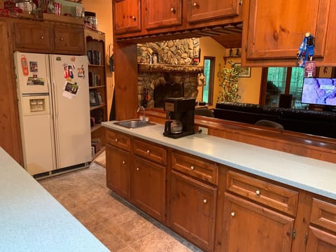 Two refrigerators and spacious bar area