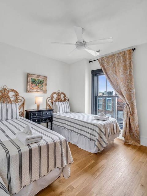 Guest Room: Bright twin beds bathed in natural light, perfect for a restful retreat in Knoxville!