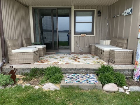 Walk from your patio across 20 feet of lawn and your toes are in the sand.