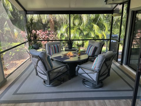 Lanai with fire pit table.
