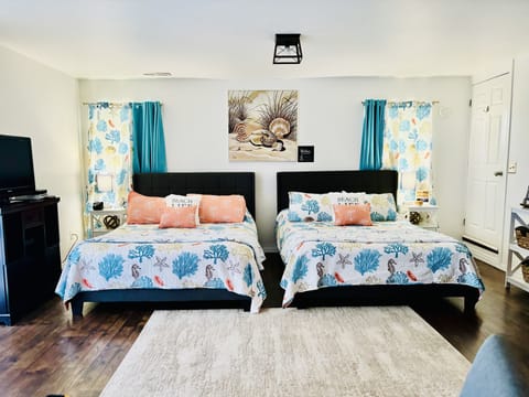 1000 Sq. Ft. Studio. Bright Airy Design, Soft Linens, Plush Hybrid Mattresses.