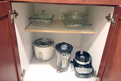 Cookware, crockpot, and blender.