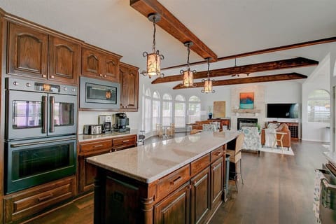 Kitchen with pots, pans, dishes, glassware and spices!

