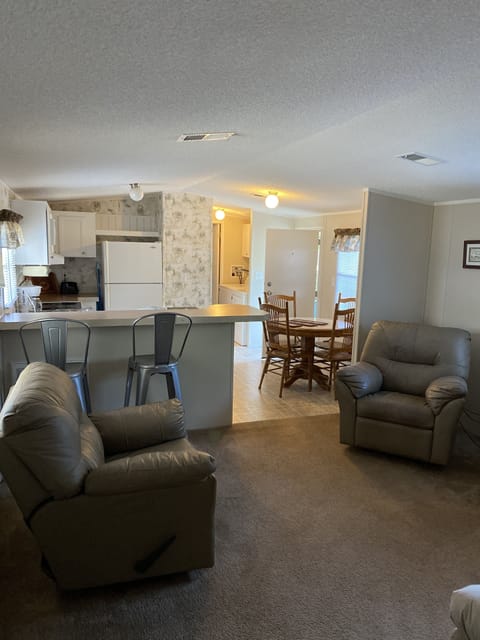 2 recliners and love seat and satellite TV. 