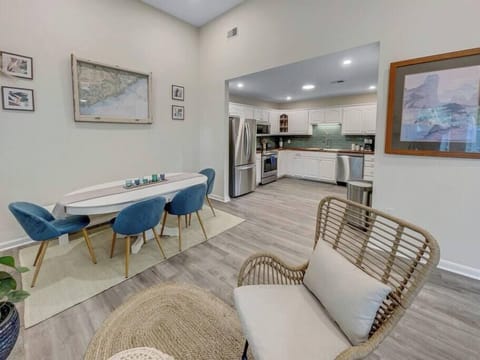 Dining room opening up to kitchen.
