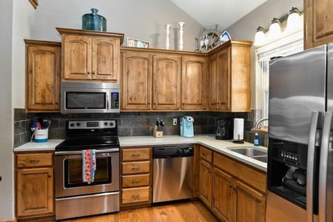 All upgraded stainless steel appliances, along with water and ice in the door of the fridge for easy access