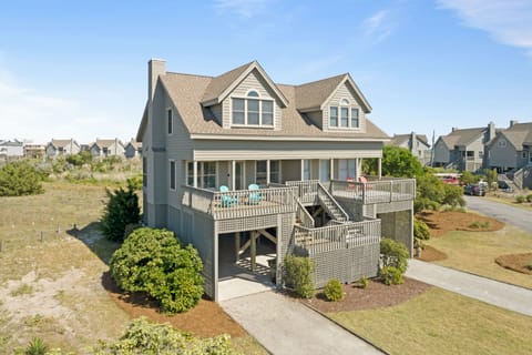 Left side is our private condo with a carport and 2 floors of great living space