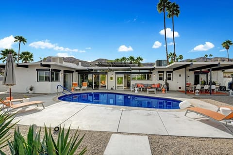 Spacious outdoor living areas with heated pool.