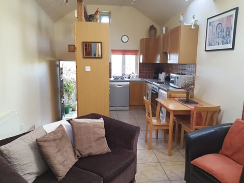 Living room with lounge, dining, entrance hall, kitchen