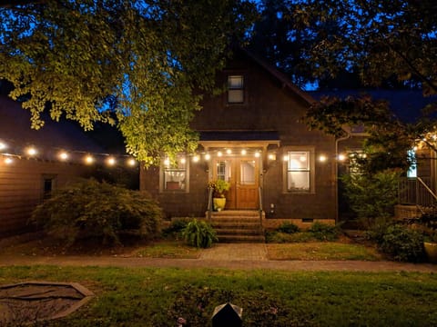 Entrance to Arts & Crafts Charmer at Night