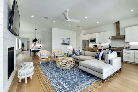 The living area opens to the kitchen and has beautiful views of the lake!