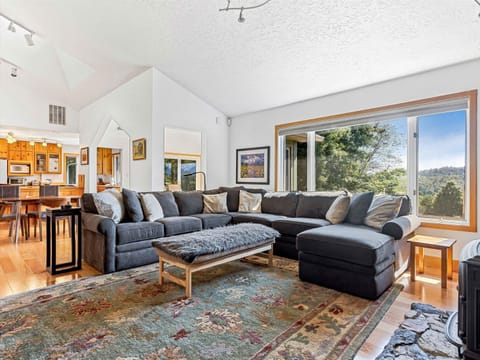 Comfortable, spacious, open plan living with vaulted ceilings