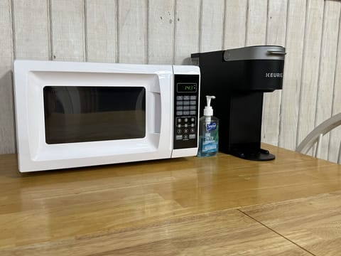 Small microwave and keurig coffee.  Rise and Shine coffee house in town also. 