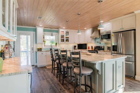 Gourmet kitchen with river sink in island