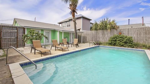 Sparkling pool with lounge chairs