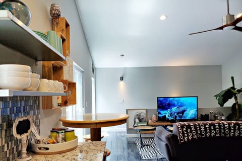 Living space adjoined with kitchen.