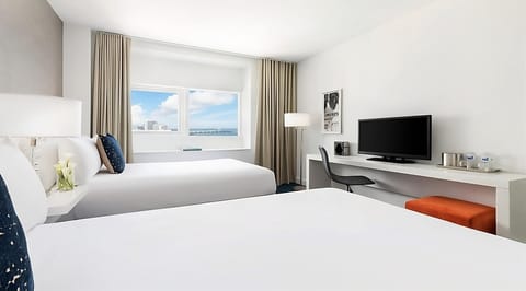 Wake up to sunshine, plush beds, and a calm workspace.