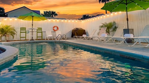 The private backyard pool is the highlight of this beach house. It can optionally be heated up to 88-degrees!
