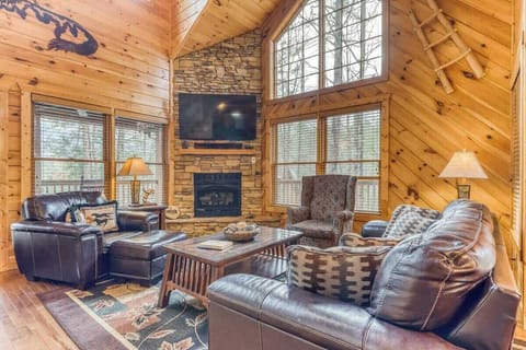 Step into a mountain retreat where soaring ceilings and big windows bring the outdoors in.