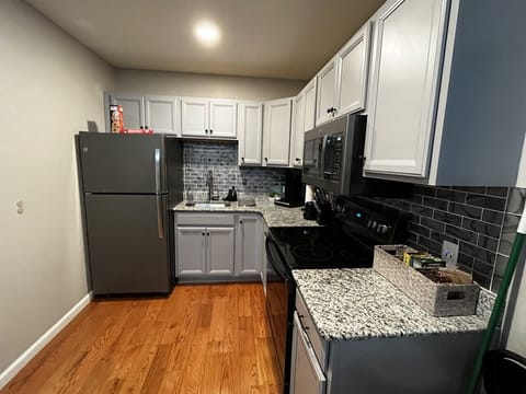 Fully stocked kitchen! All essentials - Keurig, K cups, creamer, pots / pans, spices, etc.