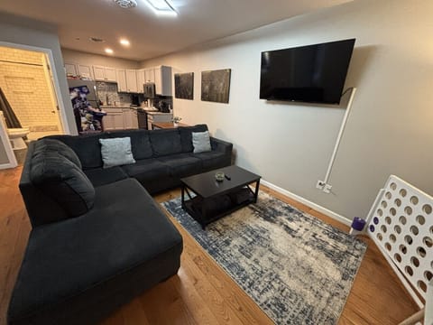 Entry / living room / dining area. Smart TV, pull out couch, large Connect4, kids books, board games and more!