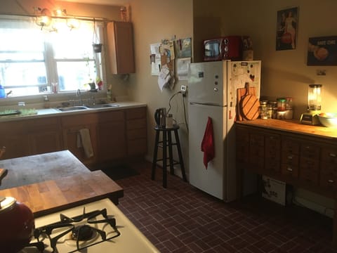 Kitchen with gas stove, plenty of prep place,  double sink & morning sun