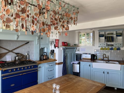 Large Family Kitchen with farmhouse dining table, gas and electric cookers etc