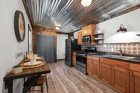 The large kitchen is fully stocked with everything you need for lake cooking.