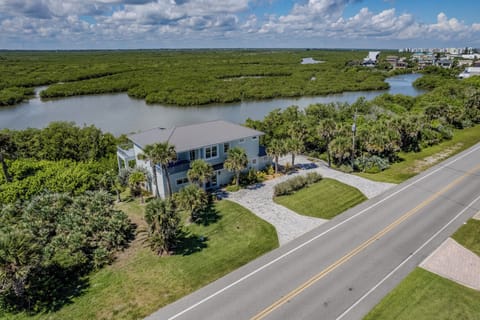 Aerial view of the home and the estuary.