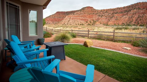 Relax in the backyard with a cozy fire pit and ample views right from the back porch!