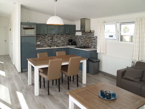 Table, Furniture, Property, Couch, Wood, Chair, Lighting, Interior Design, Hall, Kitchen & Dining Room Table