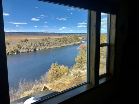 Large windows let you view the River from every room in the apartment. 
