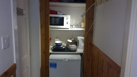 Micro kitchen. No cooker of stove. 
