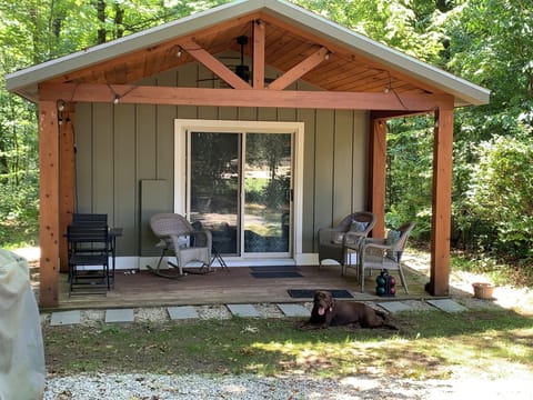 A nice cool breeze; covered front porch with seating and ceiling fan.
