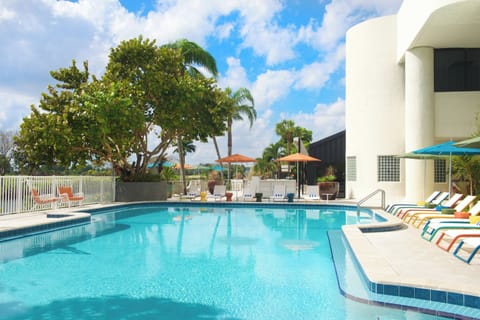 Soak up sunshine beside the sparkling pool and loungers.