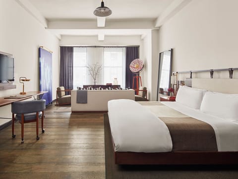 Unwind in a sunlit suite with expansive space to lounge.