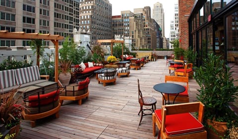 Stretch out on the rooftop terrace with lounge seating and views.