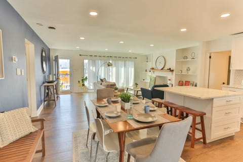 Open Living Area w/table for 6 featuring Accent Wall and Mid-Century Modern West Elm Furniture