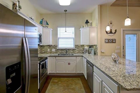 Prepare delicious meals in our fully stocked kitchen, equipped with all the essentials you need to cook up a feast during your stay.