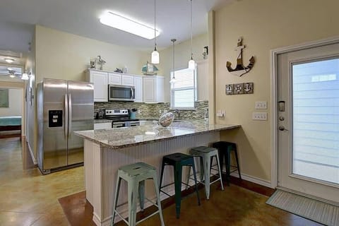 Prepare delicious meals in our fully stocked kitchen, equipped with all the essentials you need to cook up a feast during your stay.