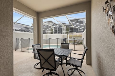 Enjoy morning coffee or evening meals at your private dining table, overlooking your sparkling pool and sun-soaked patio.