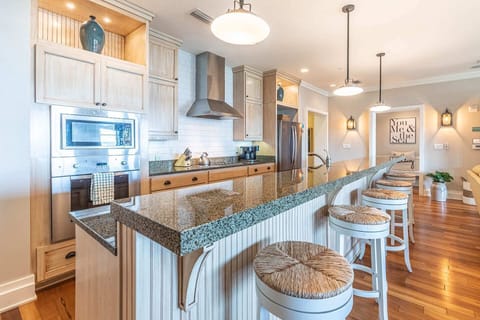 Spacious Kitchen with Large Eating Bar and Viking Appliances